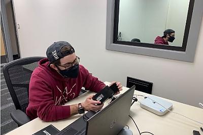 Student working with eye tracking equipment